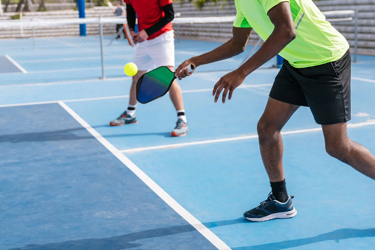 Pickleball and racket sport injury treatment at Rally Point Health and Rehab in Markham ON with RacquetFit Certified chiropractor Dr. Nicholas Cheng